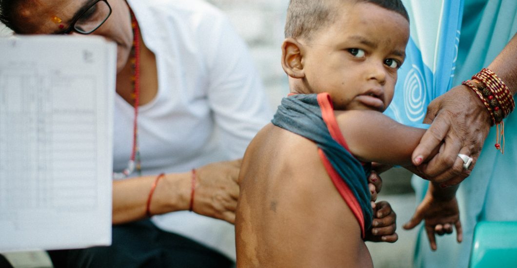 Young child with leprosy spots on his back