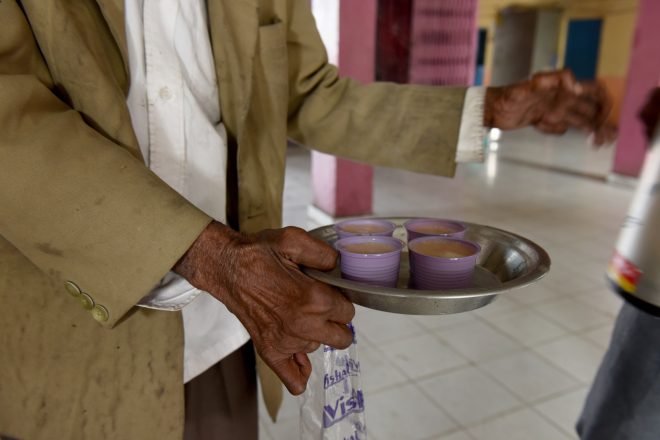 Chai tea served by a person affected by leprosy