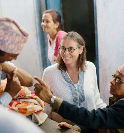 Liesbeth Miedras and leprosy doctor from NLR checking a person affected leprosy in Nepal