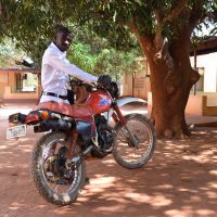 Leprosy doctor Sadraque Xavier with his transport vehicle: a motor